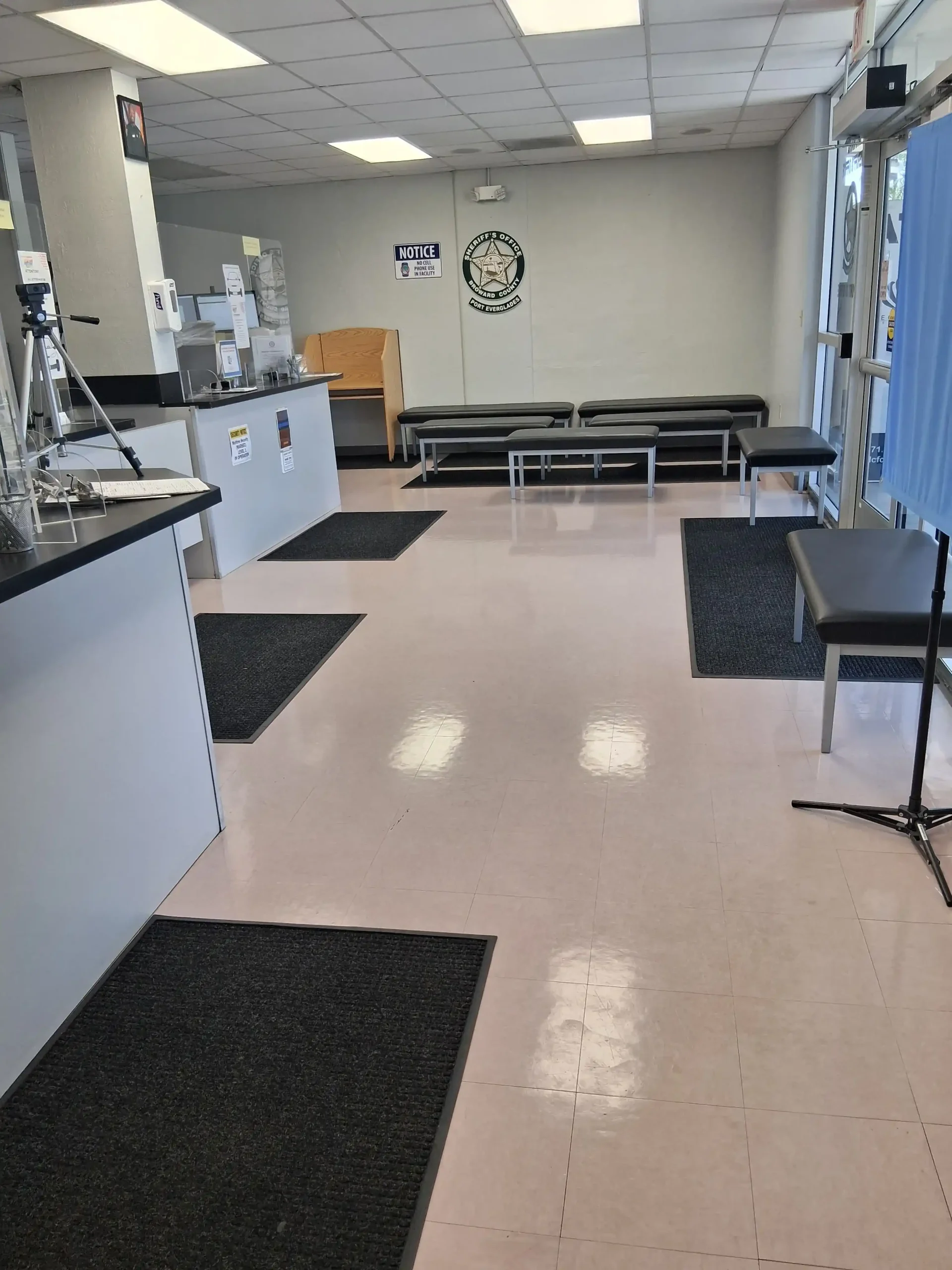 Clean polished tile floor in a Broward County public facility after janitorial cleaning